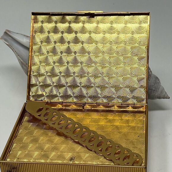 Vintage, gold tone compact/purse.  